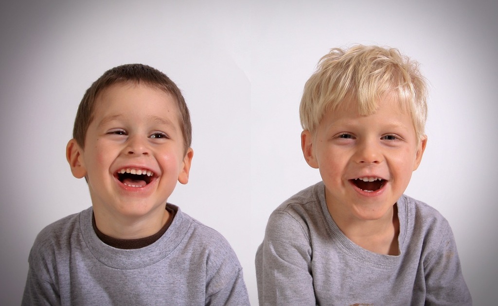 Two smiling boys for International Joke Day 2022
