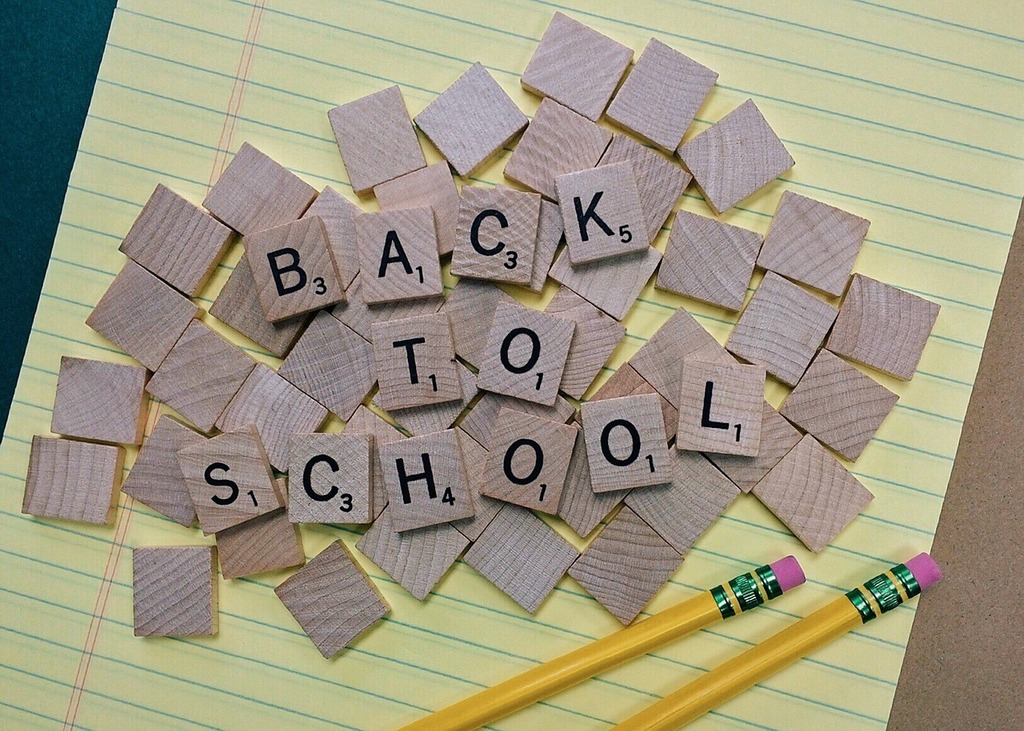 Back to school image with pencils and Scrabble letters